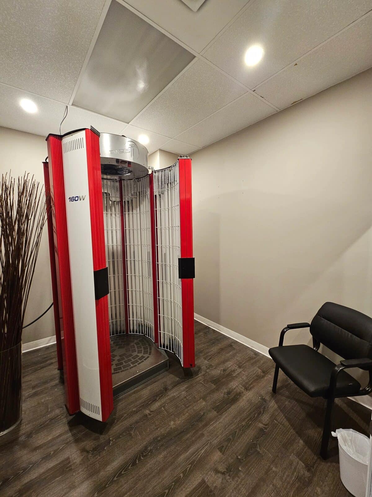 Stand-up tanning booth at Sugar Palm Spa